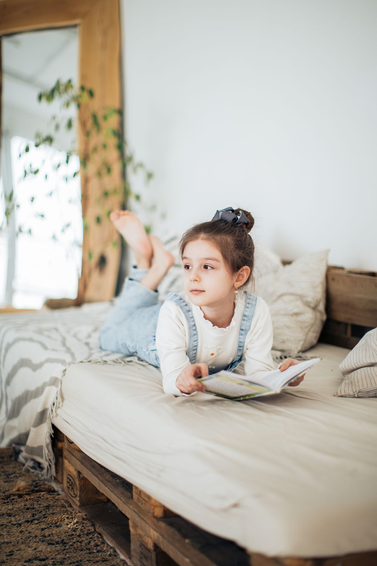 Two children studying together in warm light at home