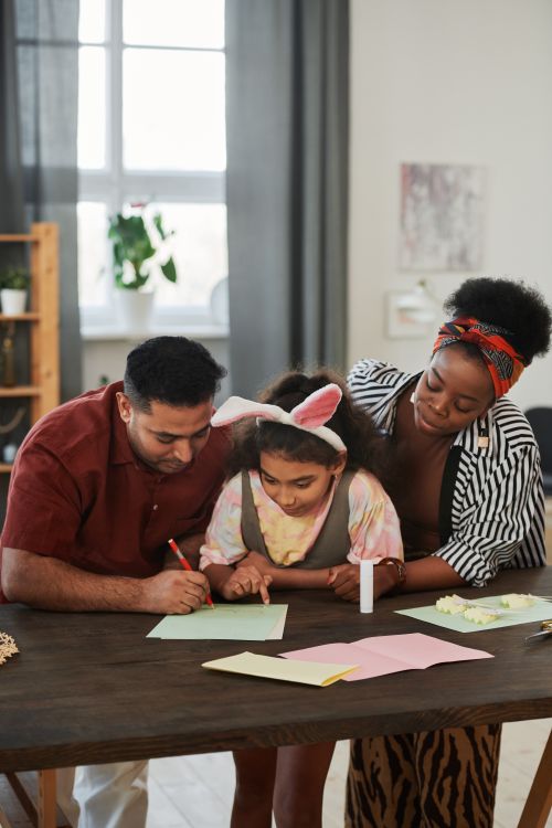 Family doing arts and crafts together at home